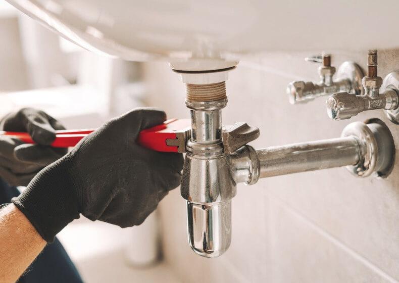 sump pump working to remove water from a flooded basement